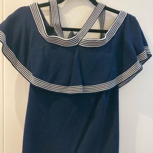 Off the shoulder blue and white blouse.